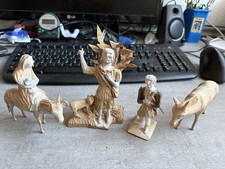 4 alte geschnitzte Figuren